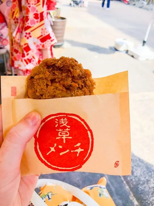 Asakusa menchi, a fried meat croquette sold along Nakamise-dori.
