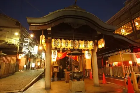 Hozenji Yokocho, a narrow lantern-lit alley off Dotonbori.