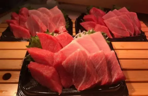 A tuna specialty shop, sushi and sashimi to order.