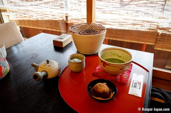 Matcha and a warmed sweet served tableside at Gion Tokuya, a mochi and matcha specialist on Hanamikoji Street.