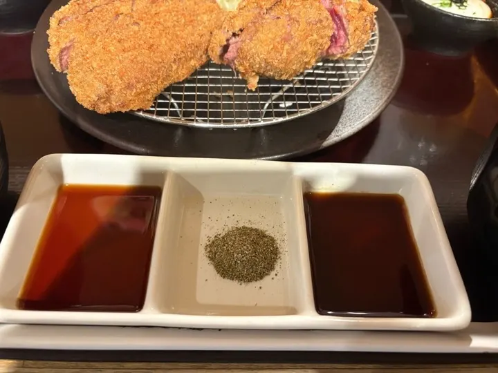 The sauce selection for dipping gyukatsu: soy, mountain pepper salt, and tonkatsu sauce.
