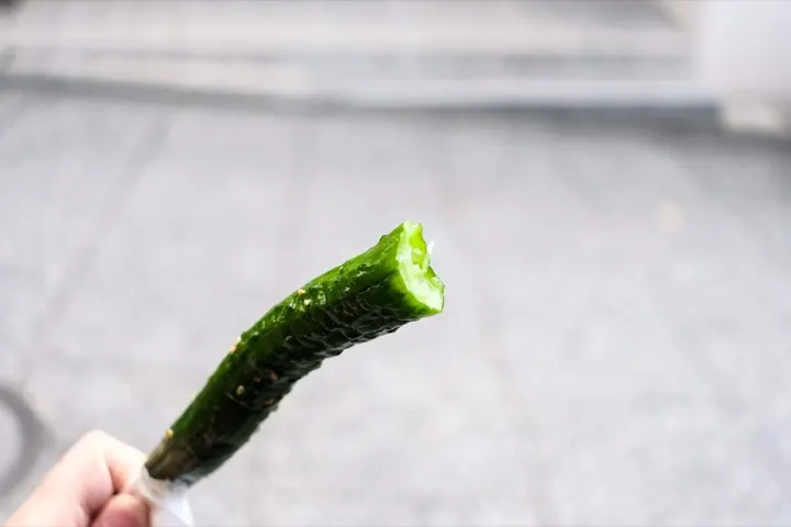 Grilled pickled cucumber on a stick, a popular Ninenzaka street snack.