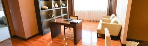 Suite reading nook with writing desk.