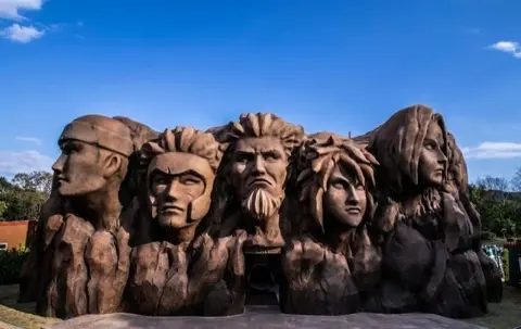 Hokage Rock, the 11-meter monument at the park's center.