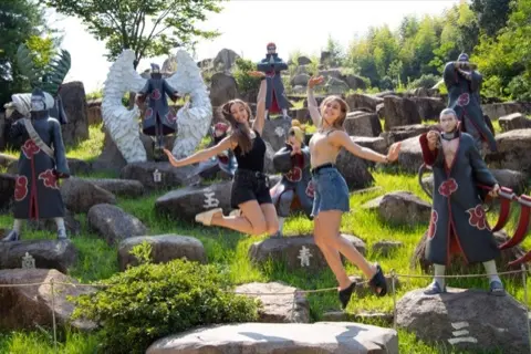 Naruto statue on the ninja obstacle bridge.