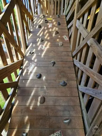 Rope-and-plank ninja climbing course.