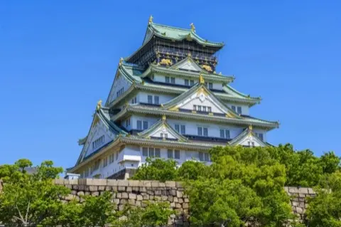 Close-up of the castle tower's gilded details.