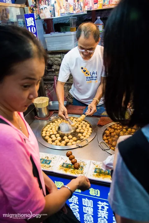 Fried fish meatballs on a stick, another popular night market snack.