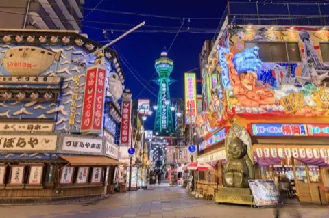 Shinsekai's retro, neon-lit streets.