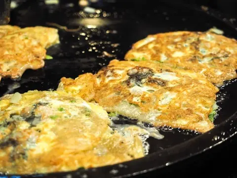 Shilin: oyster omelet on the grill.