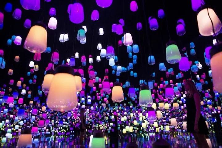 Forest of Resonating Lamps, hundreds of hanging lamps that change color as visitors walk among them.