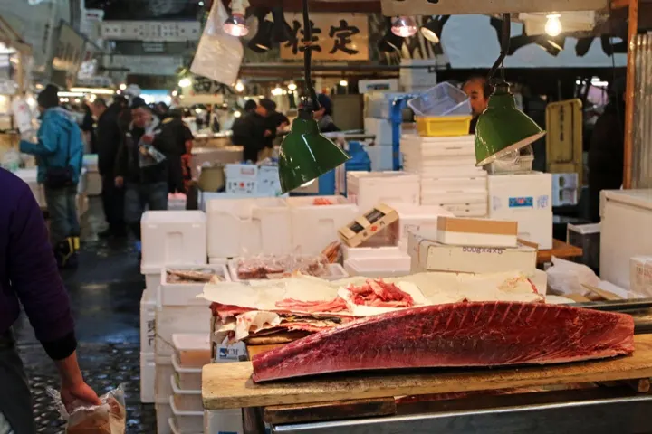 A thick-cut tuna steak, one of the market's signature seafood offerings.