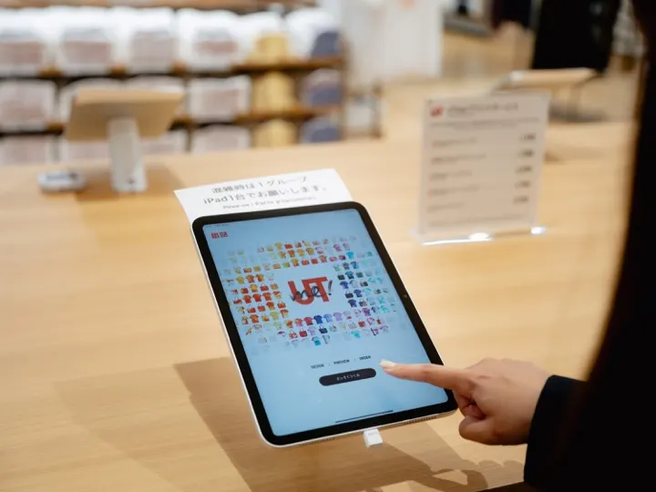 The UTme! kiosk, where shoppers design a custom T-shirt on an iPad.