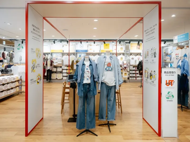 A UT collaboration display featuring Sanrio character graphic tees.