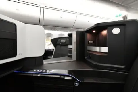 ZIP Full-Flat business class seat, upright.